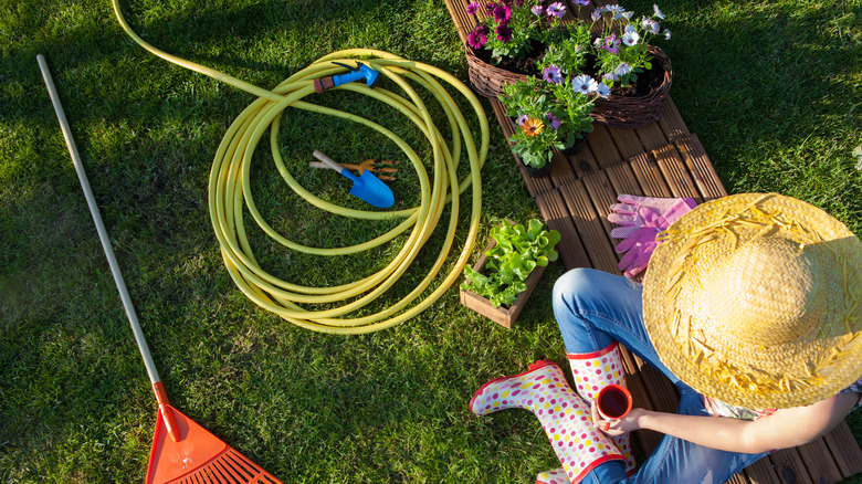 gardener with hose 