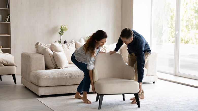 Spouses moving in new furniture