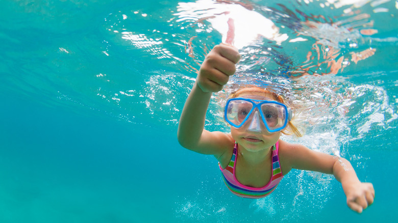 Girl underwater in pool