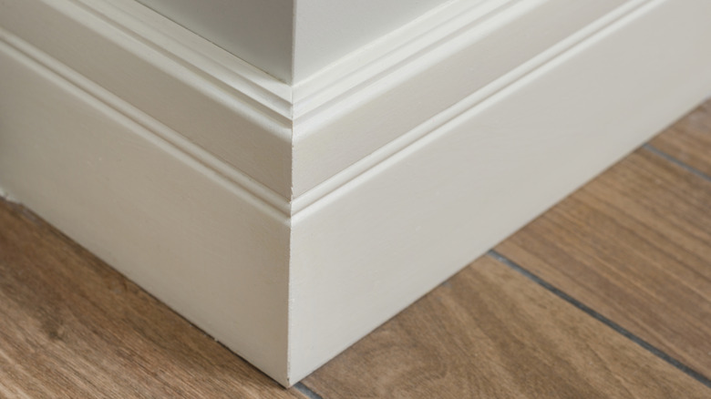 a baseboard along a corner