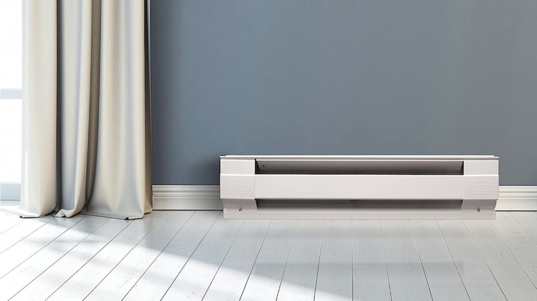 Baseboard heater on white floor