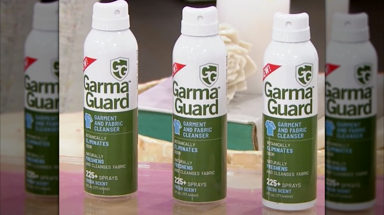 Three bottles of GarmaGuard lined up next to one another