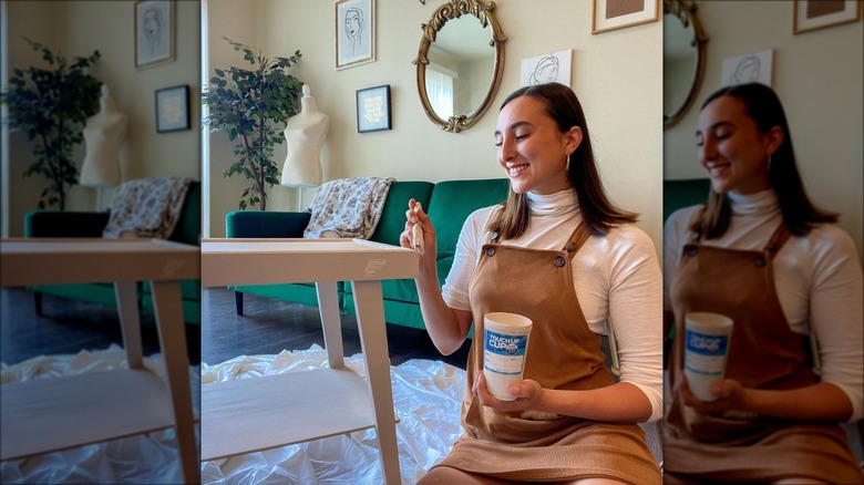 woman painting furniture