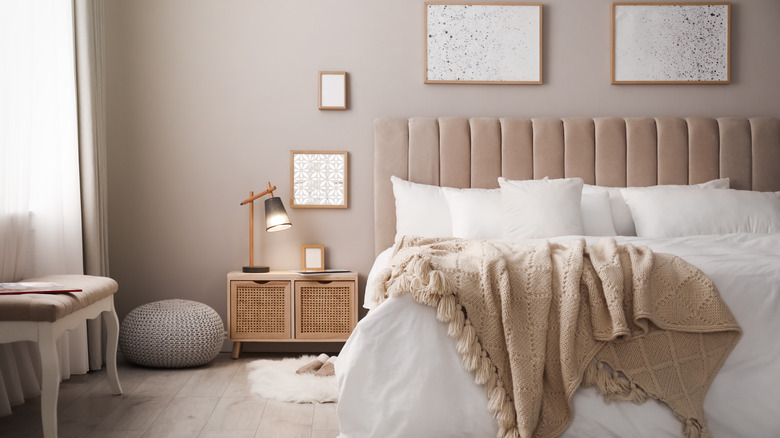 Neutral bedroom with bedside lamp