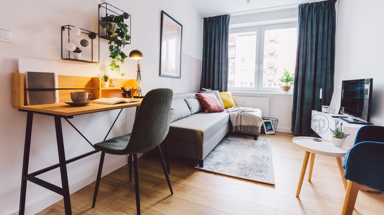 desk facing wall in apartment