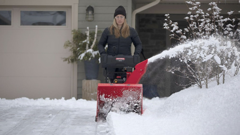 Person uses Craftsman Select 24" snow blower