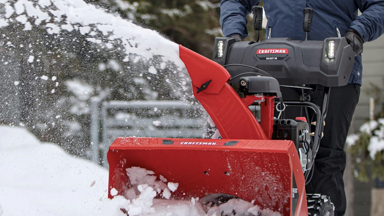 Person uses Craftsman Select 26" snow blower