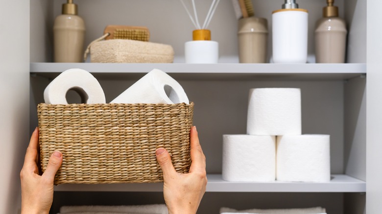 basket of toilet paper on shelf