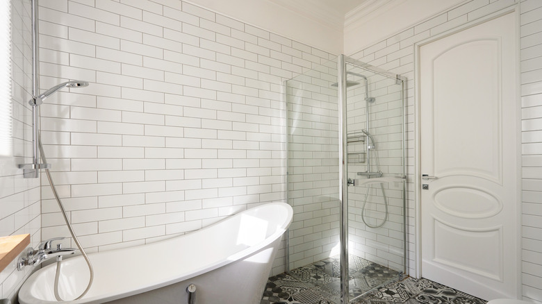 White tiles on bathroom wall