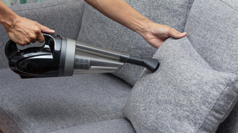 vacuuming sofa