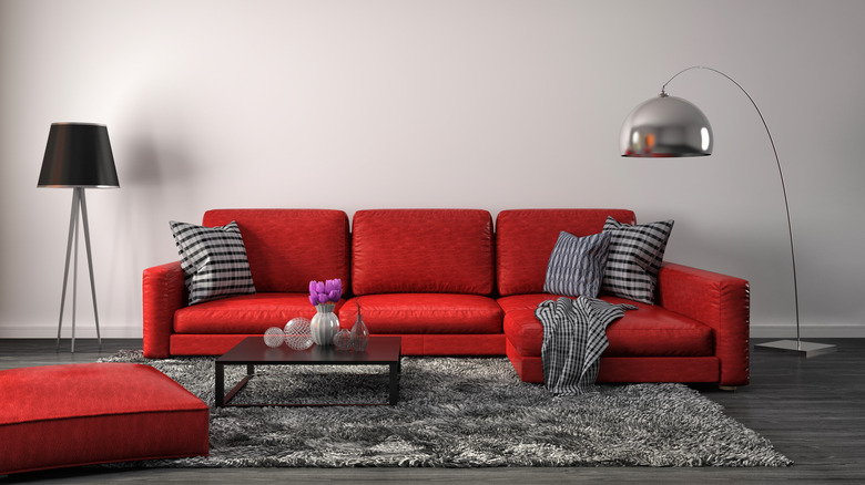 Red sofa with checkered cushions