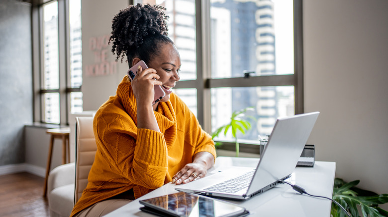 happy woman in home office