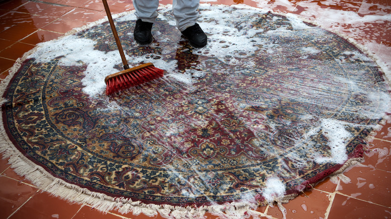 Rug cleaning in professional facility