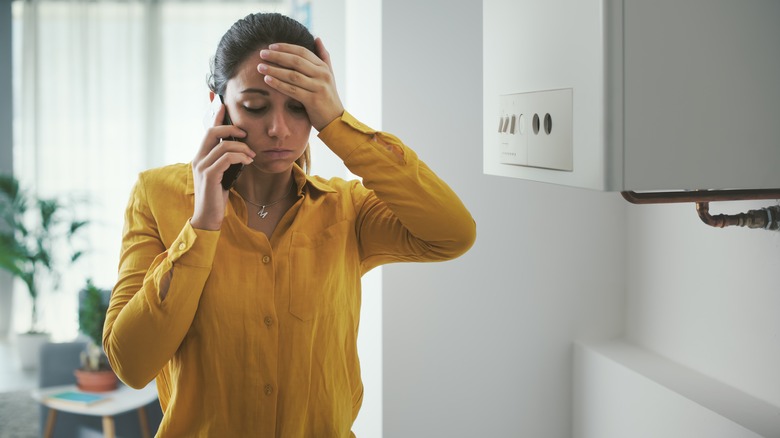 Person on phone looking worried