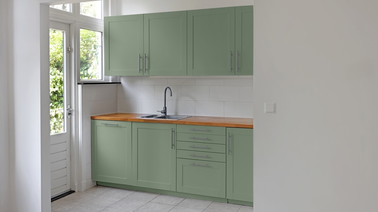 Sage green kitchen cabinets