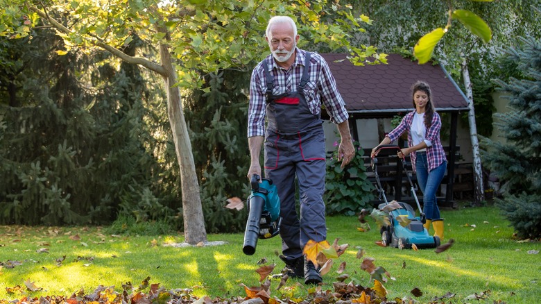 Man woman lawn care