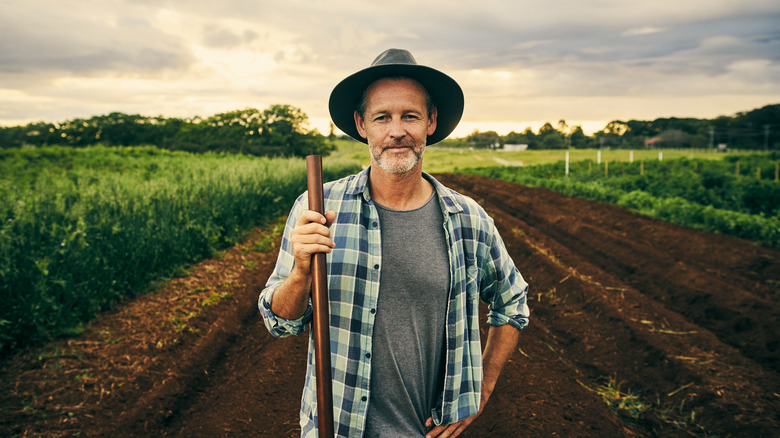 farmer standing in field