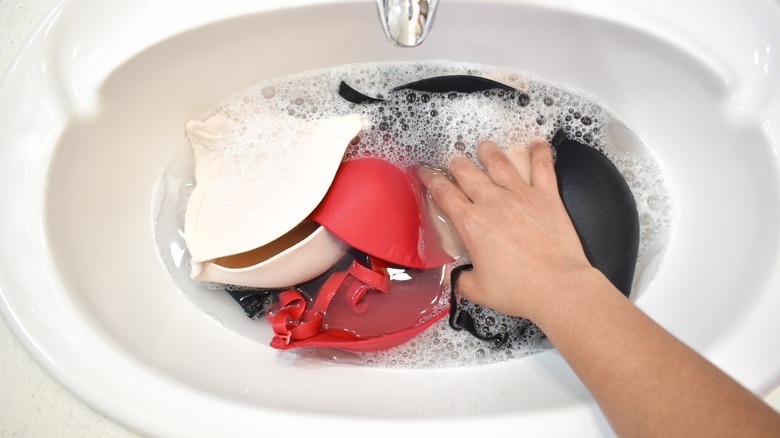 Washing bras in sink 