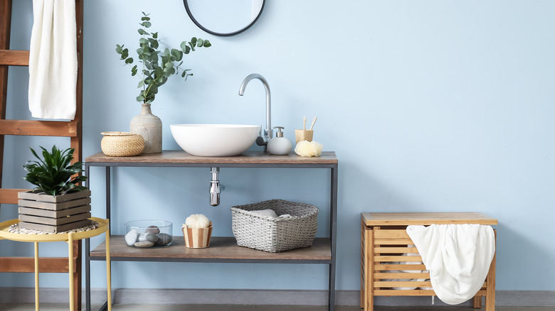 farmhouse bathroom with blue walls