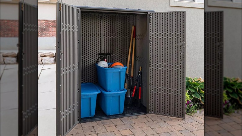 Bins and tools in shed