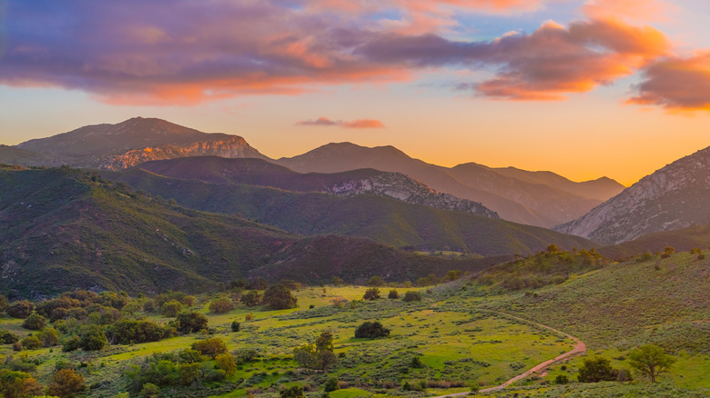 Sunset above California rolling hills