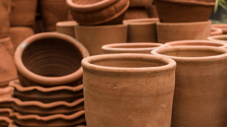 Terracotta pots stacked together outside