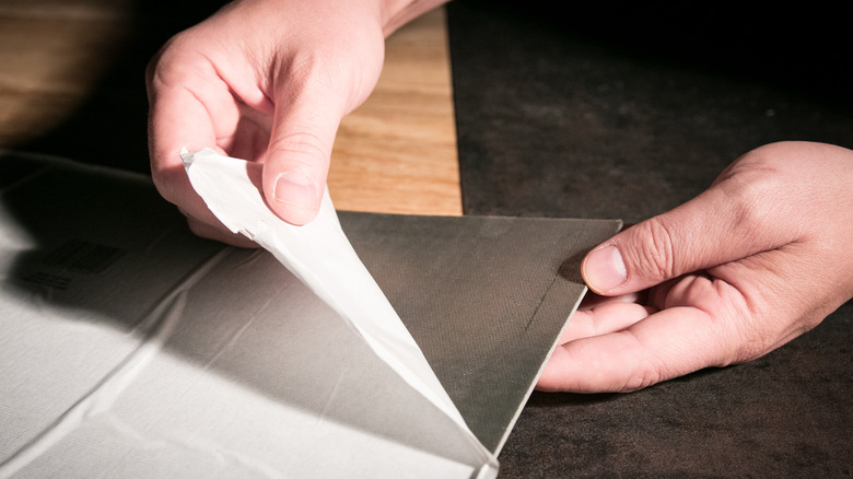 Cutting peel and stick tile