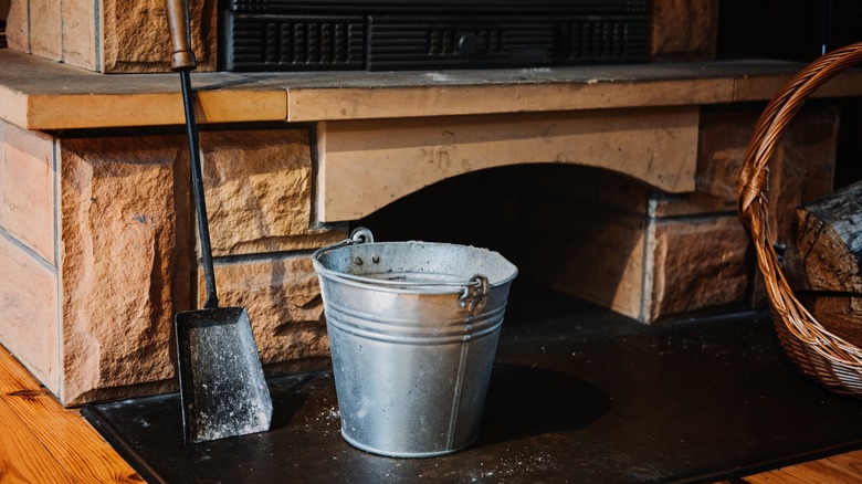 cleaning ash from fireplace