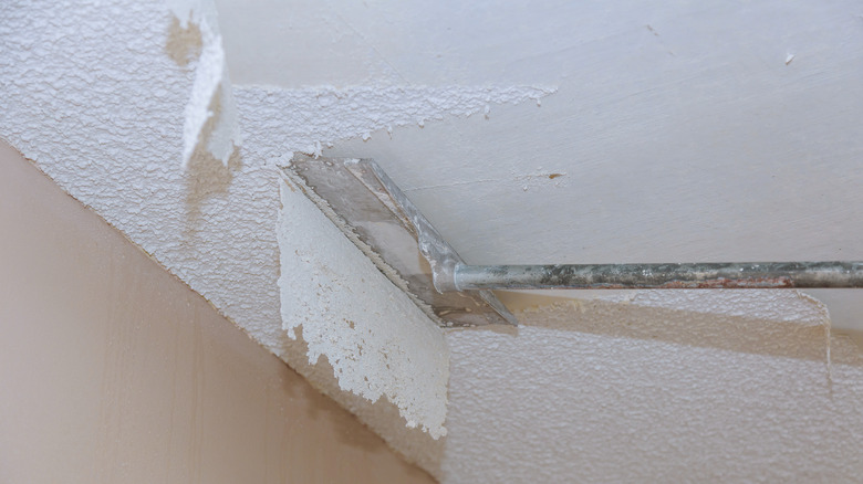 Scraping off popcorn ceiling