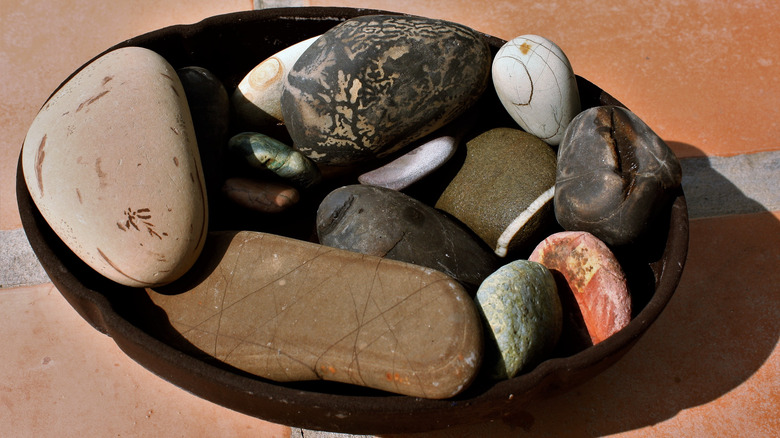 black bowl with multicolored rocks