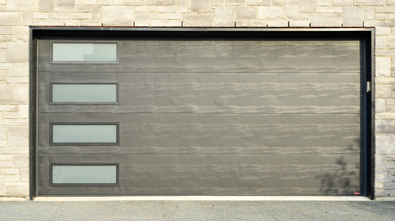 Modern garage door with windows down left side