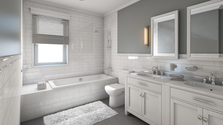 Tiled bathroom with gray walls