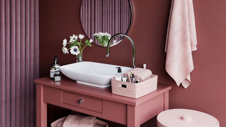 Pink vanity in mauve bathroom