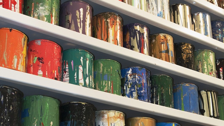 shelves of paint cans