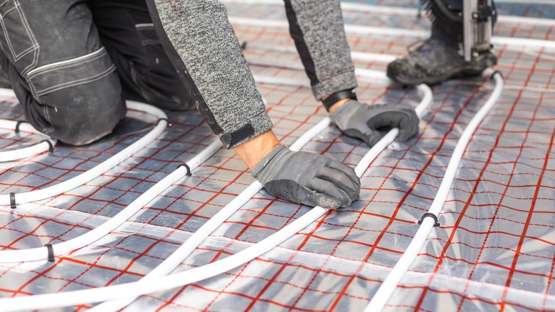 In-floor heating being installed