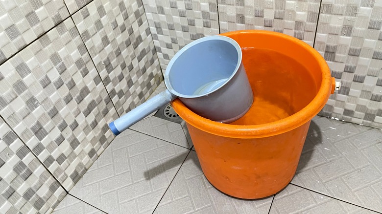 Buckets on shower floor
