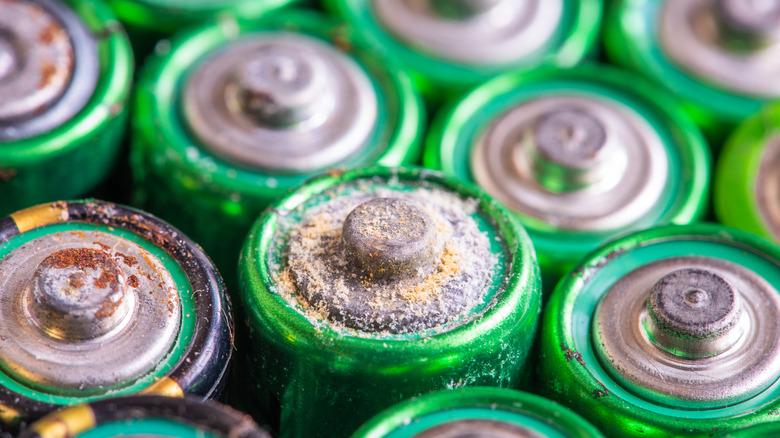 Range of corroded green batteries up close