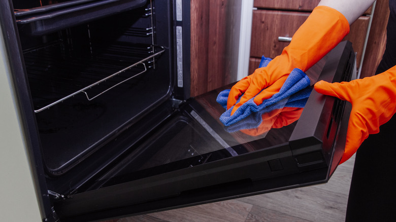 wiping oven door glass