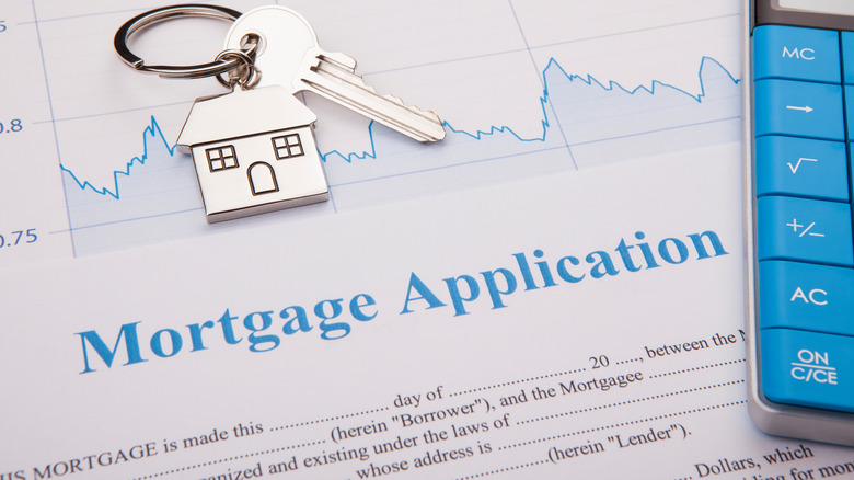 Mortgage application with key on top