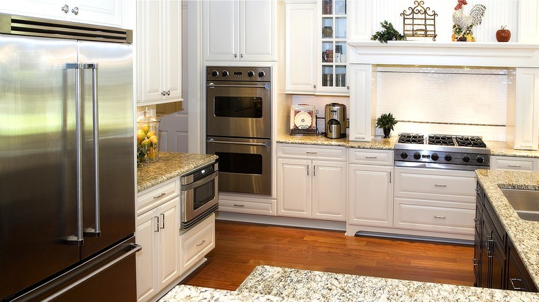 Kitchen with white cabinetry