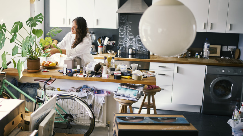 Woman decluttering home