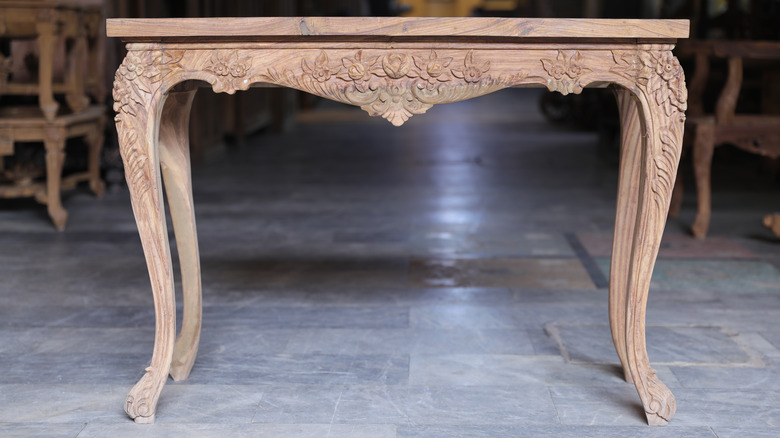 Intricately carved sissoo wood table