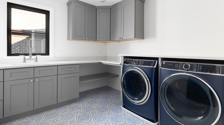 laundry room with tiled floor