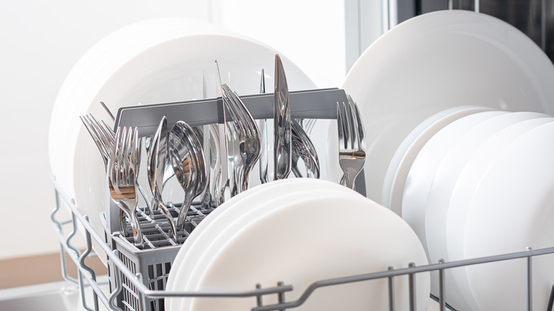 Clean dishes in washing machine