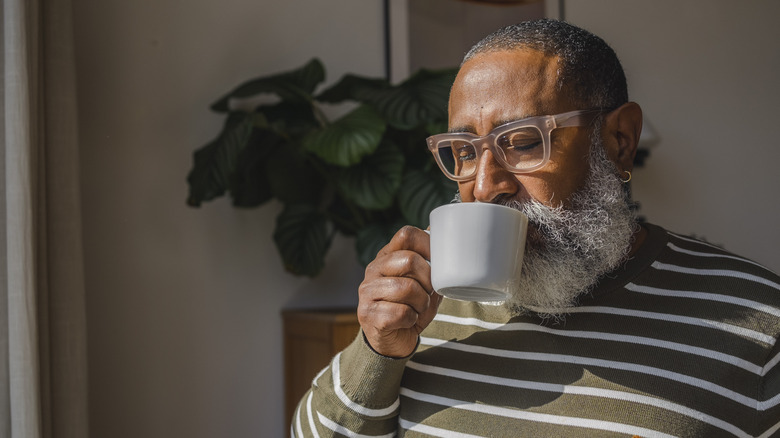 Man drinking coffee