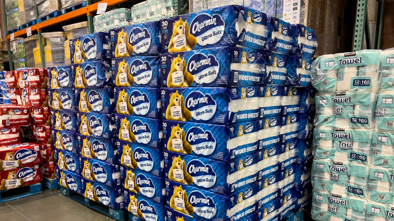 View of a pallet of Charmin ultra soft toilet paper and Kirkland Signature paper towels