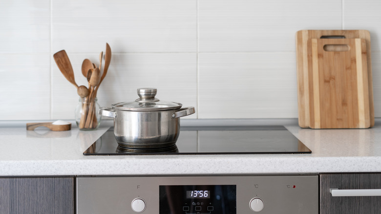 Silver pot on ceramic stovetop