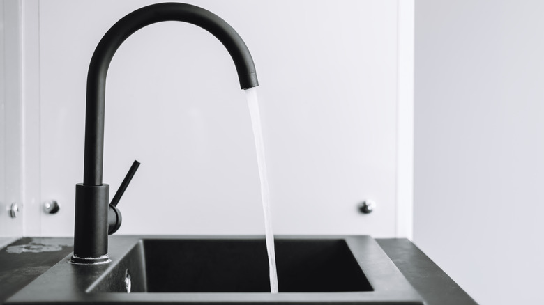 black sink with white stains