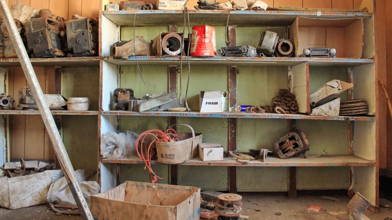 Metal shelves with items in garage