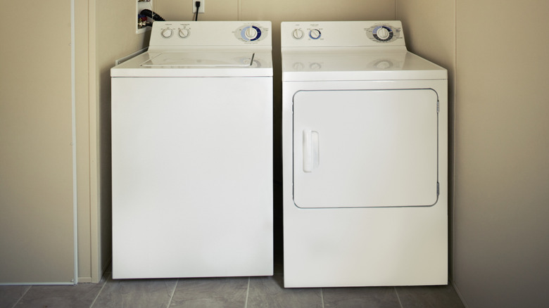 older washing machine and dryer